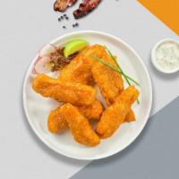 Buffed Buffalo Tenders · Chicken tenders breaded and fried until golden brown before being tossed in buffalo sauce. S...