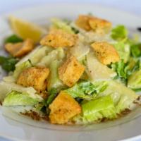Caesar Salad · Romaine hearts, shaved parmesan cheese, sourdough croutons, housemade caesar dressing, ancho...