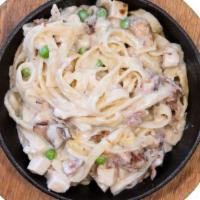 (I) Country Alfredo Individual · fettuccine noodles with creamy alfredo sauce, chicken, bacon, and mushrooms.