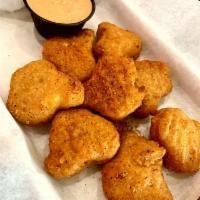 Mac N Cheese Bites · A 1/2 lb. of breaded smoked Gouda & bacon mac n cheese bites deep fried to perfection.  Serv...