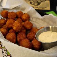 Great Balls Of Fire · A 1/2 lb. of pepper Jack cheese balls deep fried to a golden brown and sprinkled with our BT...