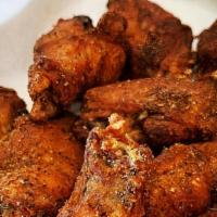 Btb Wings · A pound (8-11) of delicious wings tossed in your choice of handmade BTB sauces.  Served w/ d...