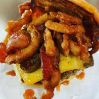 Pretty Awesome Burger · A flame grilled burger topped w/ smoked gouda cheese, sauteed jalapenos, smoked bacon, fried...