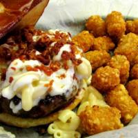The Mac Daddy · A flame grilled burger topped w/ a heaping of our popular mac n cheese, a ranch drizzle & fi...