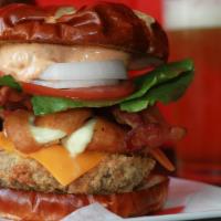 The Brickyard · A flame grilled burger deep fried and topped w/ cheddar cheese, our fried Wisconsin white ch...
