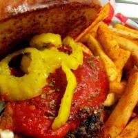 Italian Stallion · A flame grilled burger topped w/ deep fried cheese ravioli, zesty pizza sauce & grilled pepp...