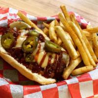 Spitfire Chili Dog · A fried dog topped w/ a healthy portion of our spicy Spitfire Chili, our house cheese sauce,...