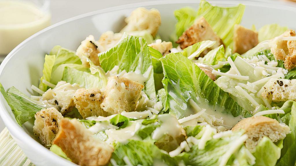 Caesar Salad · Crisp Romaine Lettuce, Grana Padano, Blistered Cherry Tomatoes, House Made Croutons, House Made Caesar Dressing