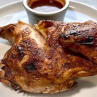 Half Bbq Smoked Chicken · We start with an overnight brine, a dry rub and then slow smoke them with our signature wood...