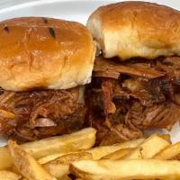Kids Pulled Pork Sliders (2) · Tossed in Texas Mop Sauce and served with Seasoned Fries