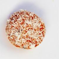 Coconut Dream · Soft raised donut filled with light coconut cream and topped with coconut shaving