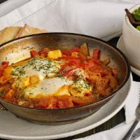 Ratatouille · Vegetarian. Organic farm eggs and cubes of feta baked in a red sauce made with sweet red tom...