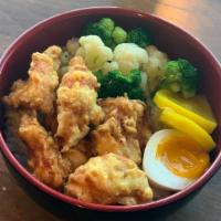 Regular Karaage Don · Seasoned fried chicken with Broccoli, Cauliflower,Takuan ipponzuke,seasoned egg, on top of s...