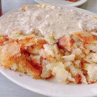 Country Omelette · Onions, sausage, cheese and sausage gravy, and a top.