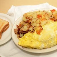 Western Omelette · Green pepper, onions, cheese and ham.