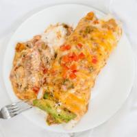 Breakfast Burrito · Fresh scrambled eggs mixed with chorizo, onions, chilies and combo cheese in a whole wheat w...