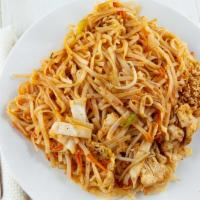 Pad Thai · Rice noodles stir-fried with egg, bean sprouts, green onions, cabbages, carrots, with ground...