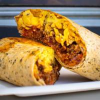 Chorizorito · Spicy chorizo, thick cut bacon, shredded cheese and house made salsa. Wrapped and grilled.