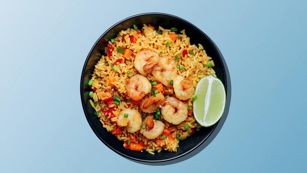 Shrimp Fried Rice · Fresh shrimp mixed with spices, onions, bell peppers, eggs, soy-garlic sauce, and seasoned fried rice.