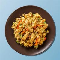 Combo Fried Rice · Seasoned fried rice tossed with spices, onions, bell peppers, eggs, and soy garlic sauce.