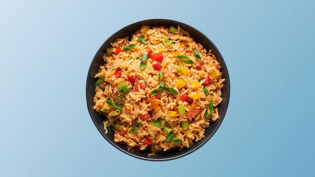 Hawkers Veggie Fried Rice · Seasonal fresh vegetables mixed with spices, onions, bell peppers, eggs, soy-garlic sauce, and seasoned fried rice.