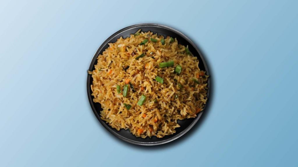 Veg Bbq Fried Rice · Seasonal fresh vegetables mixed with spices, onions, bell peppers, eggs, soy-garlic sauce, BBQ sauce, and seasoned fried rice.