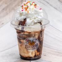 Classic Sundae · Vanilla custard with hot fudge, whipped cream, sprinkles with a cherry on top.