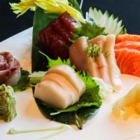 Sashimi Regular · 14 pieces of assorted raw fish.