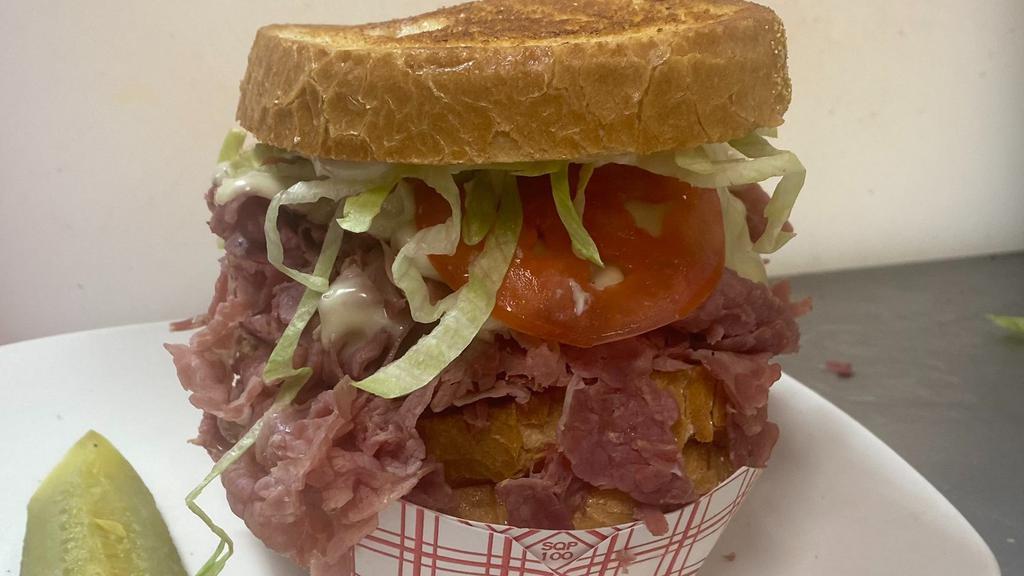 Dinty Moore · Corned beef (8 Oz), Swiss cheese, Russian Dressing, Lettuce,  Tomato, Onion Roll
No substitutions