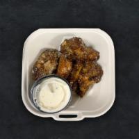 Wing Life Away · Five crispy oven-baked chicken wings tossed in whatever sauce you choose and served with a s...