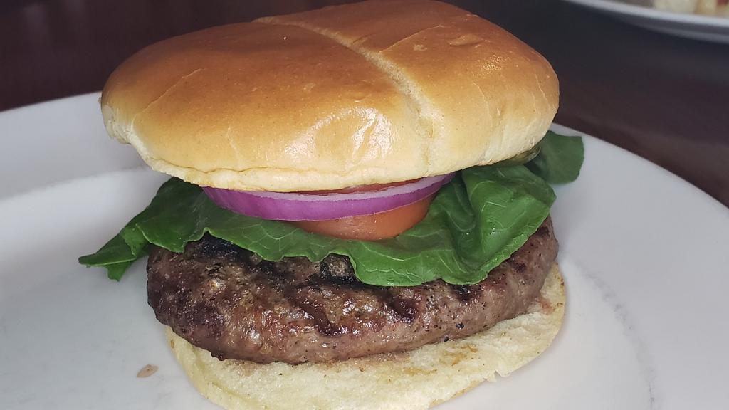 Brew Burger · Premium beef, lettuce, tomato, onion and pickle.
