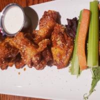 Cabco Wings · Fried, tossed in cajun wing sauce and topped with parmesan, sided with carrots, celery and b...