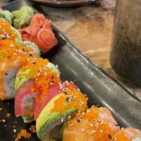 Rainbow · Crab, cucumber, and avocado, topped with tuna, salmon, red snapper, avocado and masago.