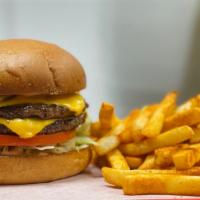 Elite Burger · Double 1/4 lb. Premium Angus Beef.  Lettuce, tomato,  pickles, American Cheese & Elite sauce.