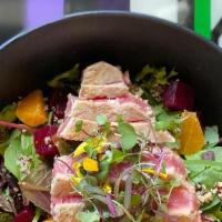 Andes Salad · Pan-seared tuna filet over spring mix with beets, quinoa, mandarin, avocado yuzu vinaigrette...