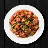 Sizzling Chili Chicken · Boneless chicken marinated in Chinese sauces, fried until crispy with stir-fried lots of gin...