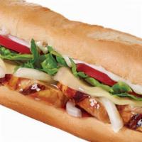 Teriyaki Chicken Philly · Grilled with onions, provolone cheese, tangy teriyaki sauce, topped with lettuce, tomato, an...