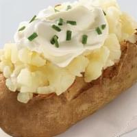 Sour Cream & Chives Potato · Sour cream topped with chives.