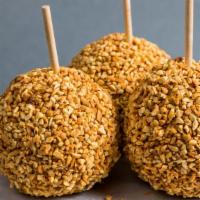 Jumbo Granny'S Smith Caramel Nutty Apple · Jumbo Granny's Smith apple dipped in caramel and topped with lots of nuts.