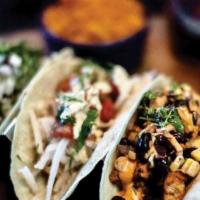 Taco Combo · Includes any three tacos, rice and beans or fries, and a fountain drink.