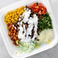 Burrito Bowl · Your choice of meat on a bed of rice and beans, topped with lettuce. tomato, cilantro, onion...