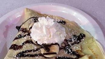 Nutella & Banana Crepe · Fresh made crepe with Nutella, banana slices, chocolate syrup and powdered sugar and whipped...