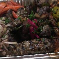 Tray For 4-6 People · Three skewer chicken kabob, three skewer beef kabob, four kafta, rice, hommous and salad.