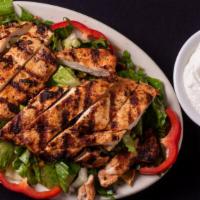 Fattoosh Tawook Salad - Large · Romaine lettuce, cucumber, tomato, onion, parsley, and toasted pita bread with chargrilled c...