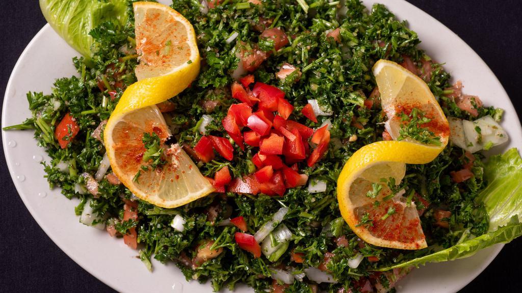 Tabbouli Salad - Large · Parsley, tomato, onion, cracked wheat, olive oil and fresh lemon.