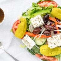Greek Salad · Garden salad with olives, Feta cheese, pepperoncini, onions, oregano, and balsamic vinaigret...