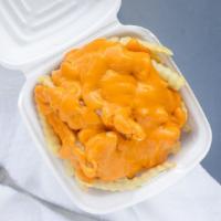 Cheese Fries · Crinkle cut french fries with cheddar cheese sauce. Cheesiest fries you ever had