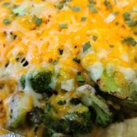Broccoli Potato · Grilled broccoli, butter, sour cream, shredded cheese bacon bits and chives!