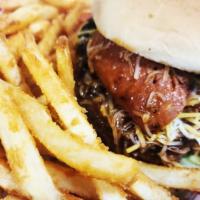 Bbq Hotlink Burger · Our ½ pound black Angus burger topped with sliced BBQ hotlinks, shredded Monterey and Colby ...