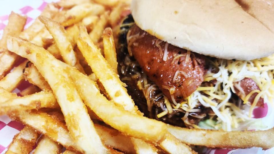 Bbq Hotlink Burger · Our ½ pound black Angus burger topped with sliced BBQ hotlinks, shredded Monterey and Colby Jack cheese, lettuce, tomatoes, onions and pickles. Includes: choice side (veggies served on the side).
